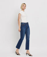 TUMMY CONTROL HIGH RISE RAW HEM KICK FLARE JEANS